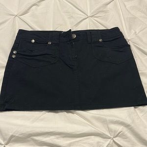 A black demon mini skirt